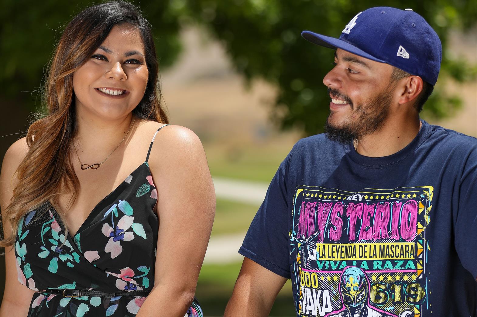 two adult siblings smiling