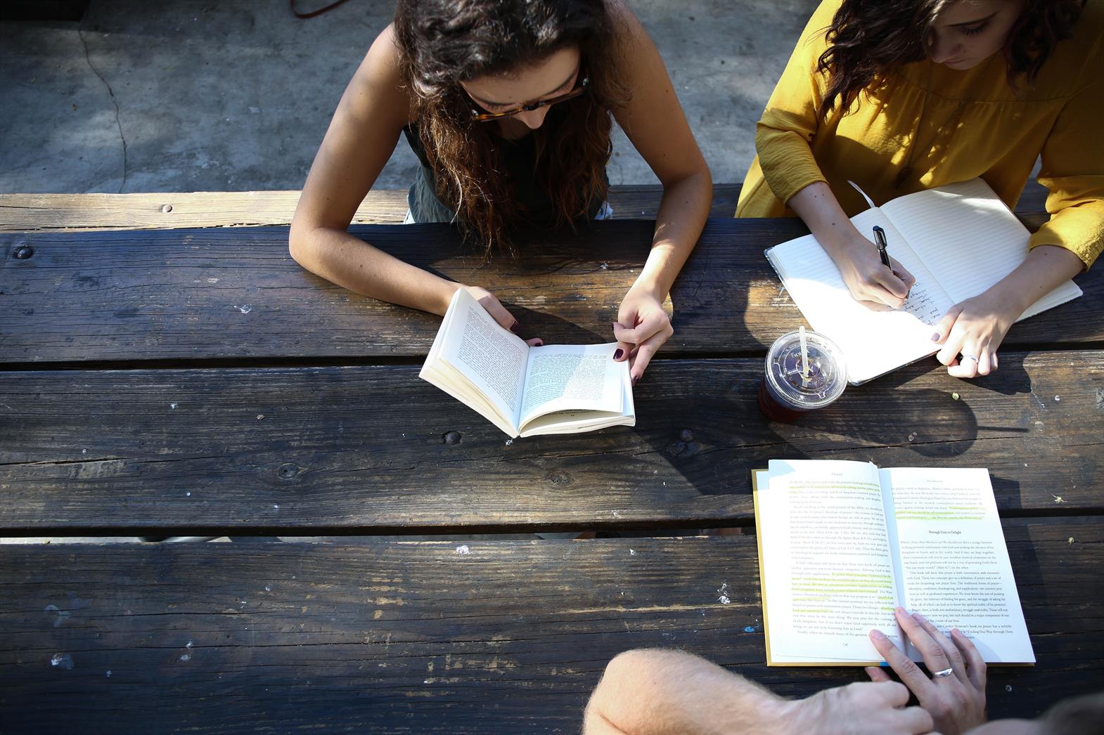 Youth women reading/studying