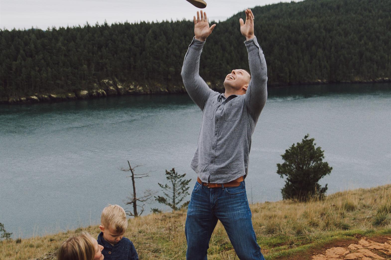 mother and father playing with children