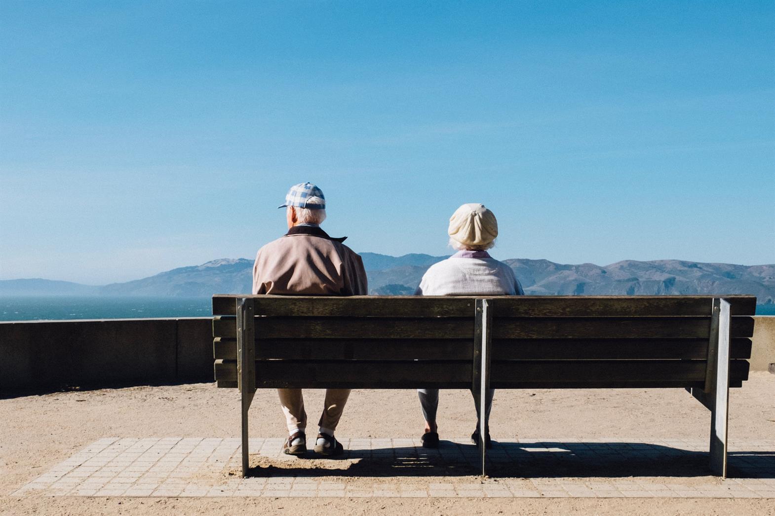 Seniors sitting on a bench