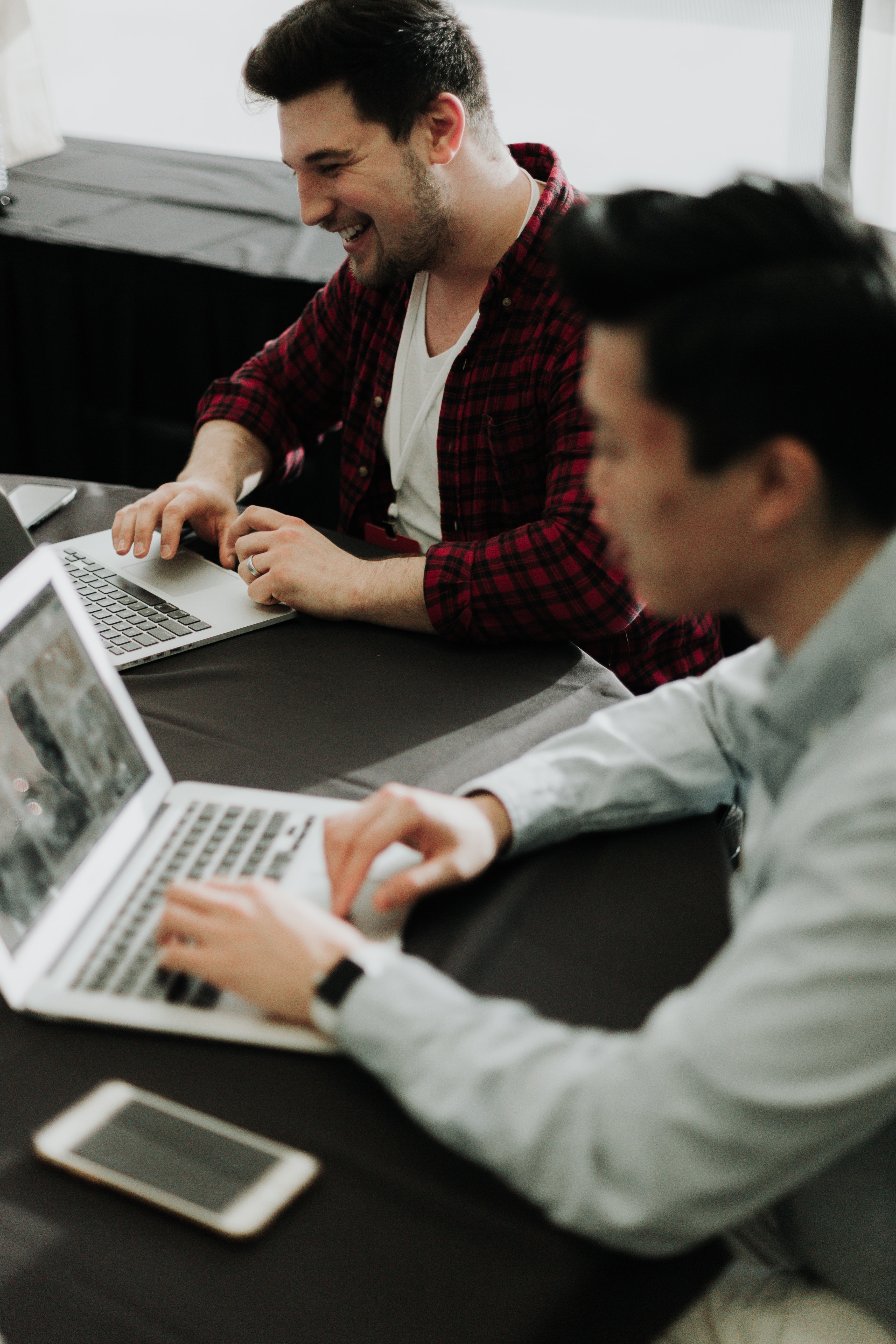 Two teens using a computer