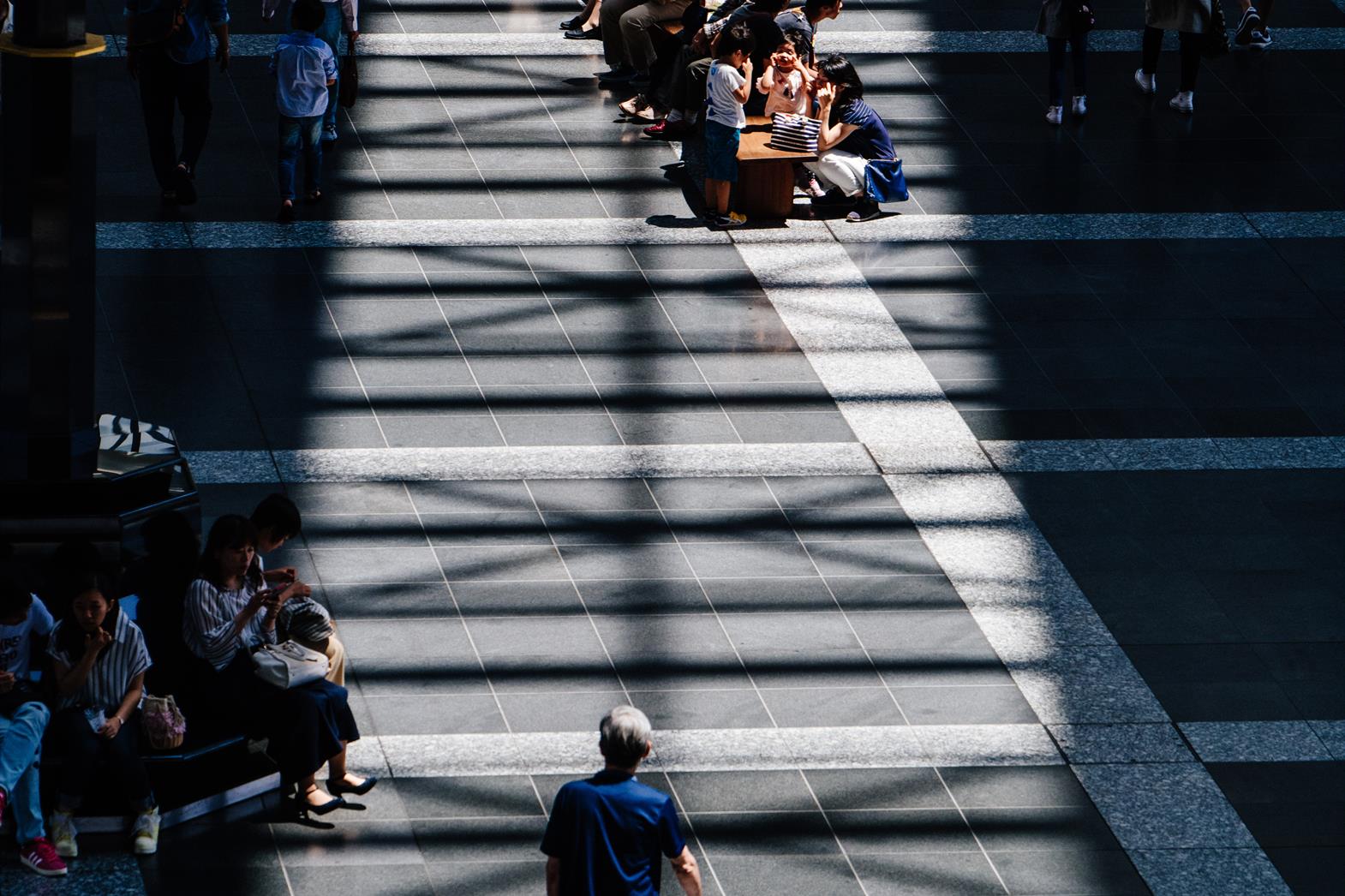 man walking on the road photo